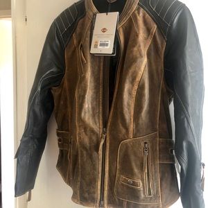 Women leather jacket with tags. Bought this a few years back but never used it.